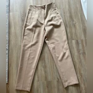 Beige high waisted pleated pants